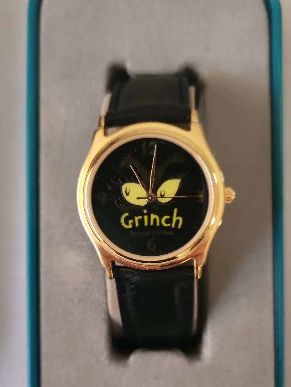 Dr. Seuss Teal Tin with Gold-Tone Grinch Watch and Black Strap